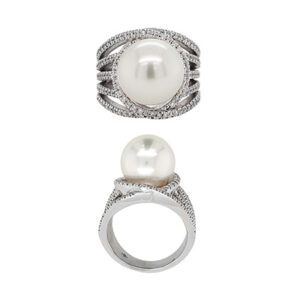 White gold ring featuring a pearl encircled by three rows of diamonds