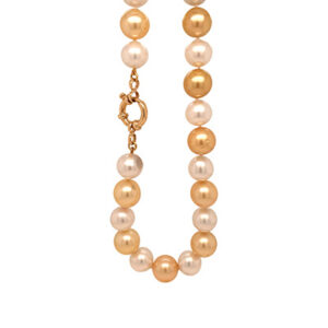 strand of cream and gold pearls