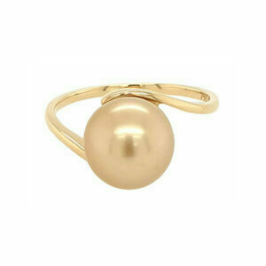 gold ring with a large golden pearl